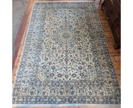 A Persian Kashan carpet, with all over foliate designs, on a cream ground, 350 x 250cm