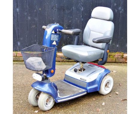A Sterling electric mobility scooter, with chargerCharges and drives ok
