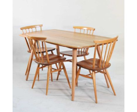 An Ercol dining table, of rectangular shape, together with a set of four Ercol stick back dining chairs (5)152w x 77d x 71h c