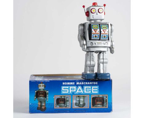 A Space Walk Man tinplate toy robot, battery operated, 31cm high, boxed