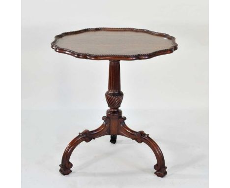 A George III style mahogany tripod table, stamped E H Truphet, on a downswept base65w x 65d x 72h cm