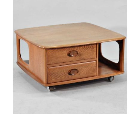 An Ercol light elm Pandora coffee table, of square shape, containing short drawers81w x 81d x 40h cm