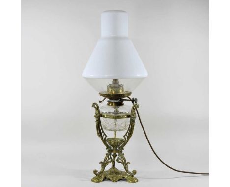 An ornate Victorian brass oil lamp, with an opaline glass shade, converted to a table lamp, 68cm highOverall condition looks 