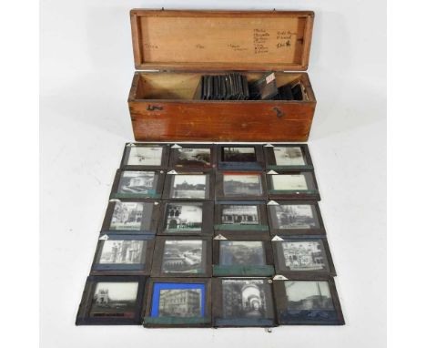 A collection of magic lantern slides, scenes of France and Italy, in a wooden box