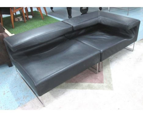 'LOW SEAT' SOFA, two seater, sectional in black leather on chromed metal supports, by Moroso, 181cm L.