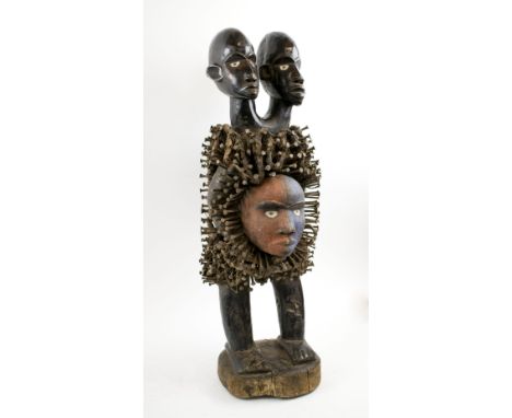 TWIN HEADED FETISH FIGURE, D. R. Congo, carved wood with nails and sisal detail, 71cm H overall.