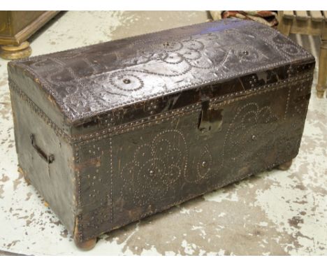 TRUNK, 18th century leather bound and brass studded with hinged domed top dated 1735, iron handles and later feet, 54cm H x 9