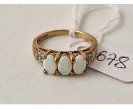 A three stone opal ring 9ct size N 2.7 g