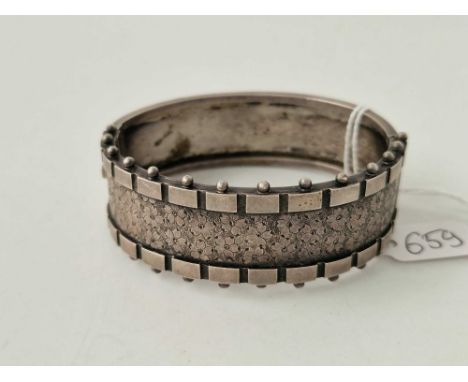 A Victorian silver fancy bangle 31 g
