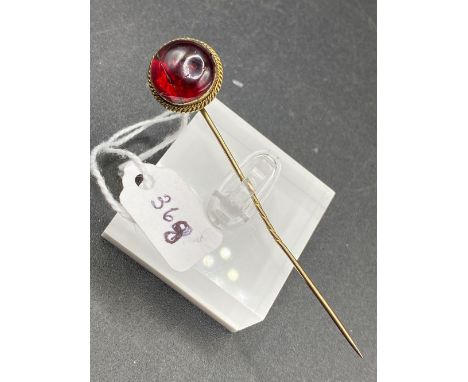 A large garnet carbuncle stick pin AF