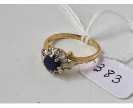 A SAPPHIRE AND DIAMOND CLUSTER RING, 18ct, size R, 4.5 g