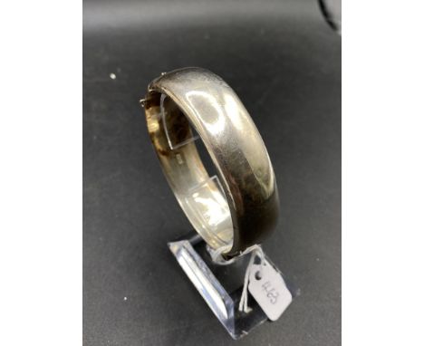 A silver hinged bangle, 29 g
