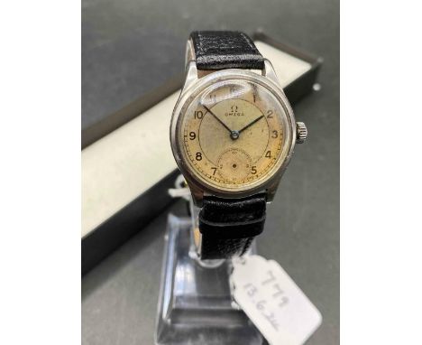 A gents vintage OMEGA wrist watch on leather strap no second dial hand