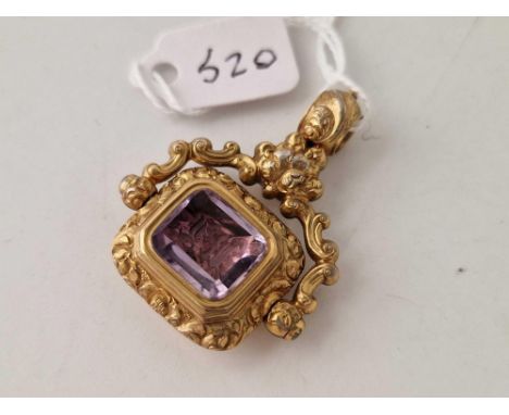 Antique Victorian gold cased spinning fob, set with an amethyst to one side and chalcedony intaglio to the other, crested wit