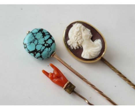 Three stick pins, coral hand, cameo and turquoise matrix