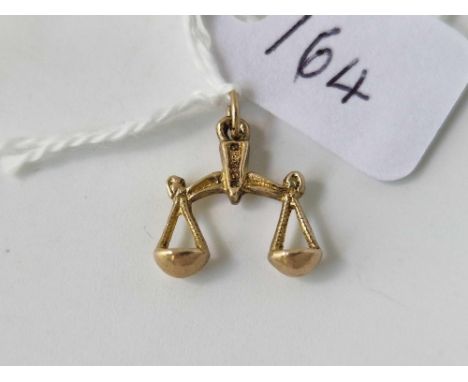 A Libra scales charm, 9ct