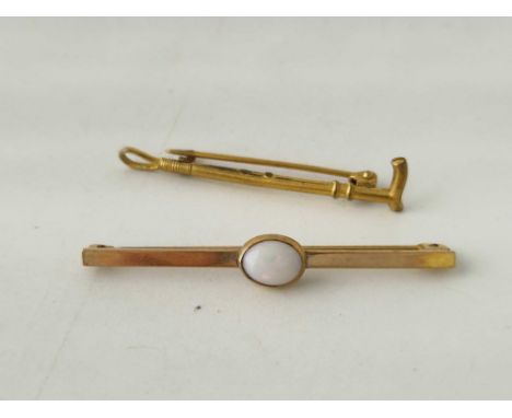 A opal set bar brooch 9ct 2.5 g and yellow metal riding crop brooch