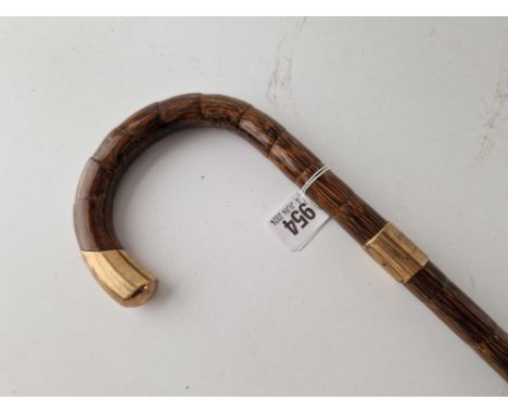 A 9ct mounted walking stick, 36 inches long