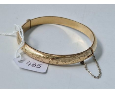 A rolled gold bangle