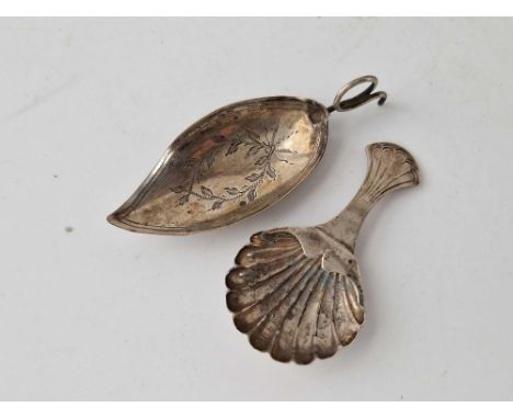 A leaf shaped caddy spoon Georgian, A/F, 1801 and another with shell bowl, Birmingham 1816