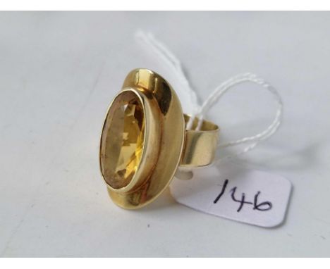 A LARGE OVAL CITRINE RING, 14ct, size M, 6.4 g