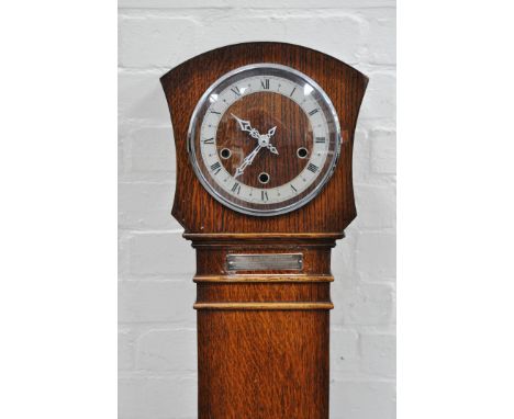 Oak cased presentation grandmother clock, silvered chapter ring, placed battery movement, height 140cm.