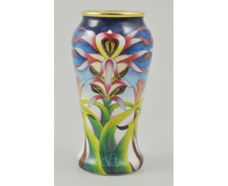 Miniature Moorcroft enamel vase, in original fitted box, decorated with Orchids, bearing mark to base, E.T4, height 9cm.