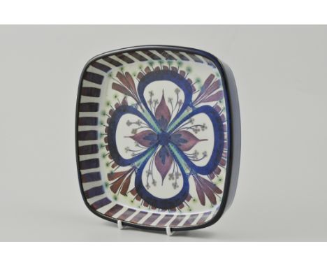 Marianne Johnson for Royal Copenhagen, Denmark, 1960's square dish decorated in tones of blue, mauve and green with central f