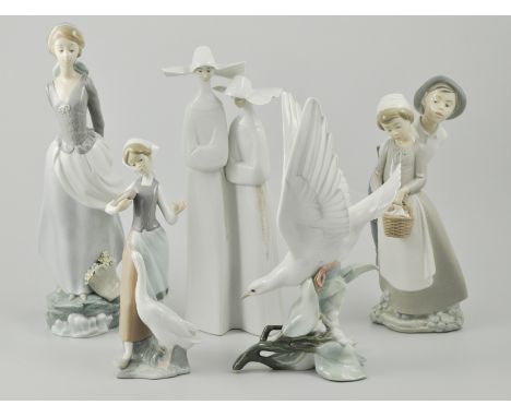 Lladro model of a Dove, 28cm, a Lladro figure of a Lady, 36cm, another Lladro group of nuns and a Nao group of a boy and girl