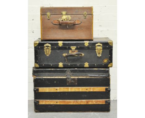 Small cloth trunk, width 46cm and two other trunks, (3).