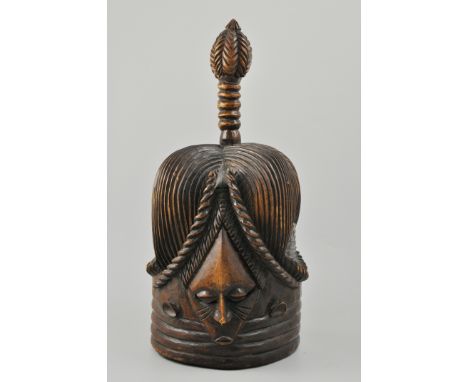 Sierra Leone "Mende" carved wood mask, carved with faces to the front and back, with a carved head finial top, height 46cms.