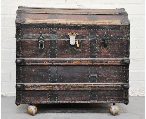 Vintage domed top trunk, with metal banding, width 69cm.
