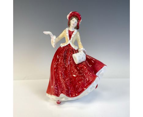 Bone china figure wearing red dress with relief pattern, matching overcoat with fur lining, and a multicolored feathered hat.