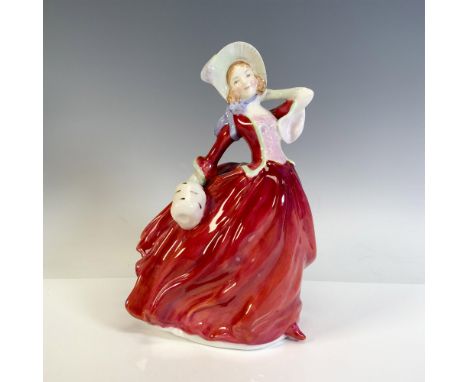 Hand painted, glossy figure dressed in long red flowing dress, holding her hat. Royal Doulton backstamp. This item has its or