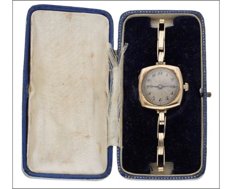 An early 20th century 15ct gold lady’s wristwatch by Rolex, the circular engine-turned dial with black Arabic numerals, withi