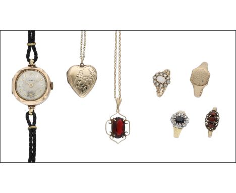 A collection of assorted jewellery, including a 9ct wristwatch by Tempo with leather strap, a 9ct heart-shaped locket on chai