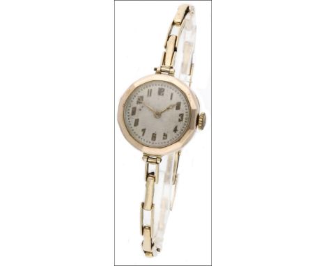 An early 20th century 9ct gold lady’s wristwatch by Rolex, manual wound, the circular dial with Arabic numerals, within dodec