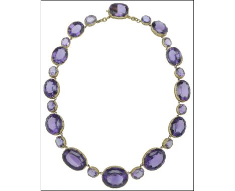 A gold mounted amethyst rivière necklace, 19th century, composed of large graduating oval mixed-cut amethysts, spaced by smal
