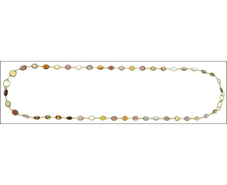 A multi gem-set necklace, spectacle set with gemstones including garnet, citrine, amethyst, aquamarine, etc, between fine tra
