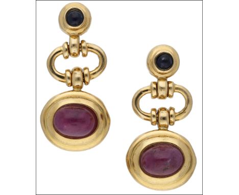 A pair of 18ct ruby and sapphire earrings, the three tier earpendants composed of a collet set ruby cabochon, the oval connec