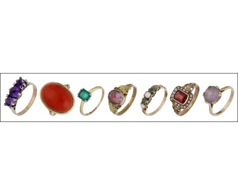 Seven gem-set rings, comprising an amethyst ring, set with three cabochon-cut amethysts, with rose-cut diamond points between