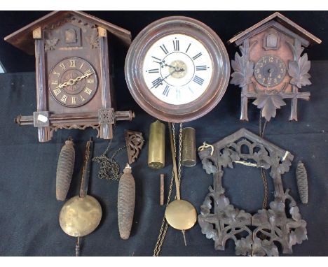 TWO OLD CUCKOO CLOCKS, AND A POSTMAN'S ALARM CLOCKand another cuckoo clock front (all for spares or restoration)