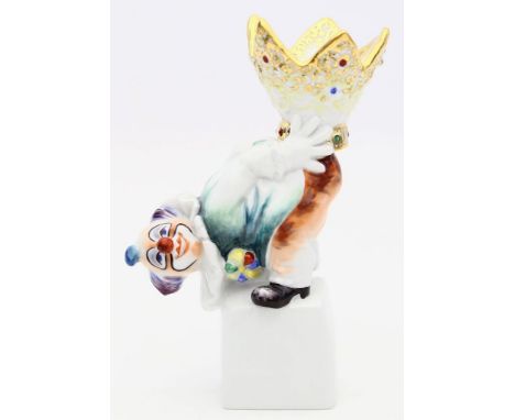 Danielczyk, Jörg (geb. 1952 in Altzschillen) "Clown mit Krone auf dem Rücken", als figürlicher Kerzenleuchter. Bunt bemalt. E