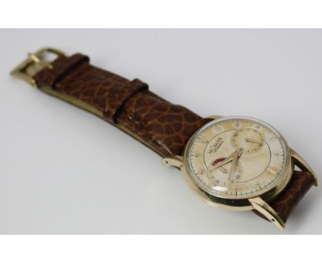 Herrenarmbanduhr "LeCoultre", Modell "Futurematic". Rundes, 10 kt. goldfilled-Gehäuse mit im Boden integrierter Krone. Vergol