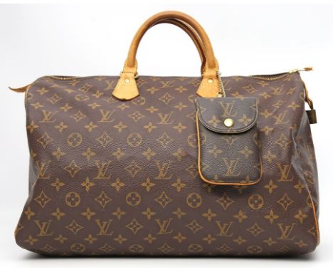 Tragetasche "Speedy". Louis Vuitton. Monogram Canvas, hellbraune Beschläge aus Rindsleder, gem. "LOUIS VUITON PARIS made in F