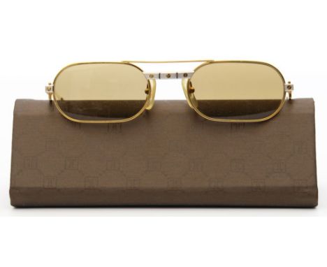 Vintage-Sonnenbrille, Cartier. Modell "Santos". Metall, vergoldet. Nasenrücken und Bügelansätze mit Schraubendetails in Bicol