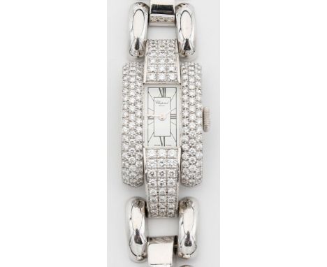 Damenschmuckbanduhr "Chopard", Modell "La Strada". Rechteckiges, gewölbtes Gehäuse und angesetztes Gliederband 750/000 WG, br