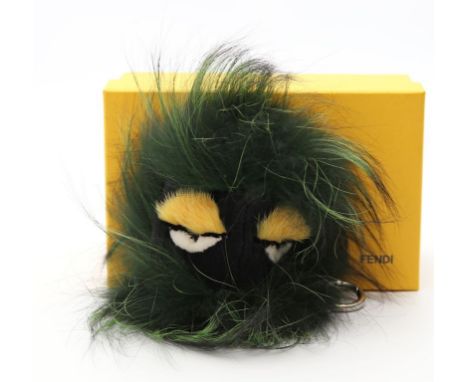 Taschen- bzw. Schlüsselanhänger "Monster", Fendi. Fuchs- und Nerzpelz in dunkelgrünen und schwarzen Tönen. Schlaufe aus schwa