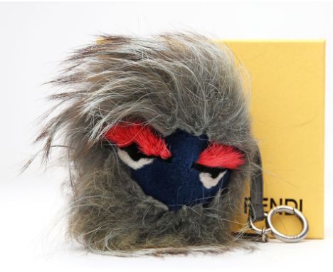 Taschen- und Schlüsselanhänger, Fendi. Fuchs- und Nerzpelz in roten und taupfarbenen Tönen. Schlaufe aus Leder und silberfarb