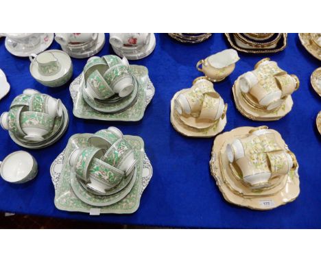 A Paragon China Canterbury Bell pattern tea set comprising eleven cups and saucers, ten plates, two cake plates and milk jug 